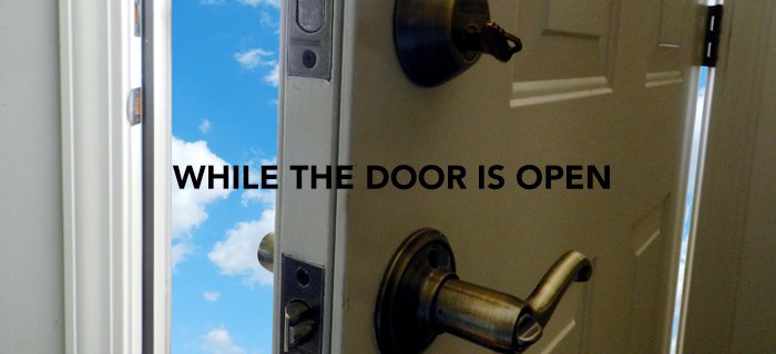 While The Door Is Open poster